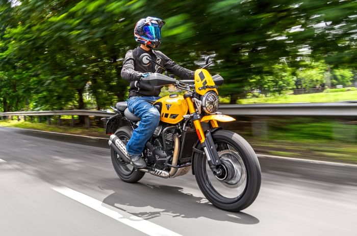 Triumph Scrambler 400 XC front right riding shot